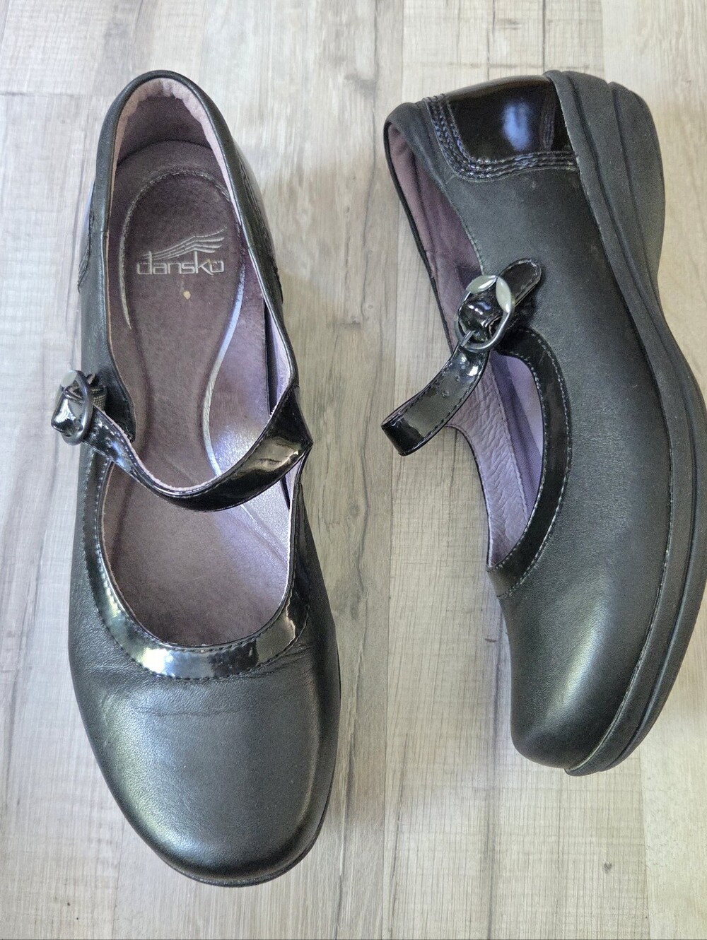 Dansko Women’s Black Nappa And Patent Leather Mary Jane Shoes